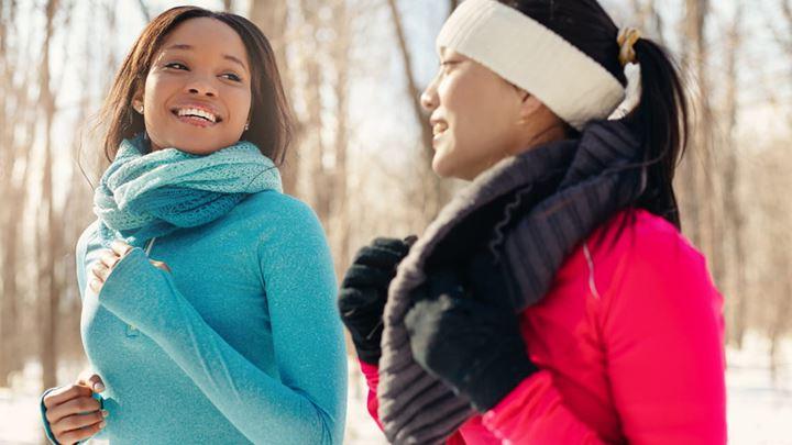 women exercising outdoors in cold weather